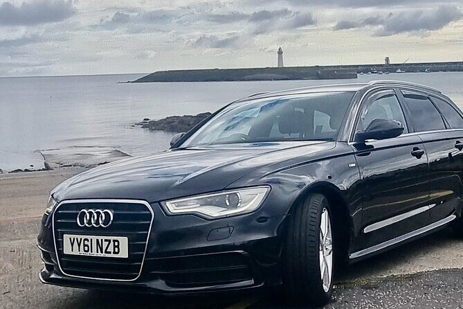Game of Thrones - Private Audi A6 tour with Richard the Wildling - Stop 1: Ballygally for Will’s beheading viewpoint and Door of Thrones No. 9