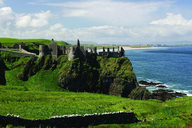 Giant’s Causeway and Titanic Experience from Belfast Port - Dunluce Castle photo stop: quick but dramatic